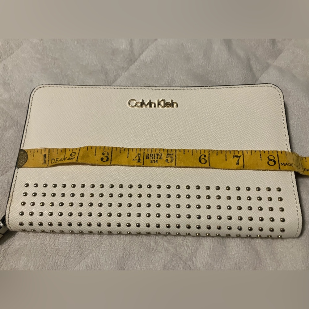 White Leather Calvin Klein clutch with 3D studs & logo